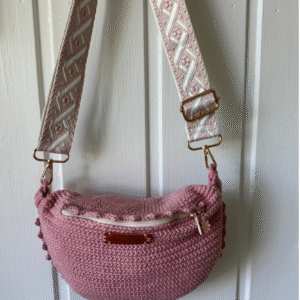 B) Crossbody-veske/Rumpetaske