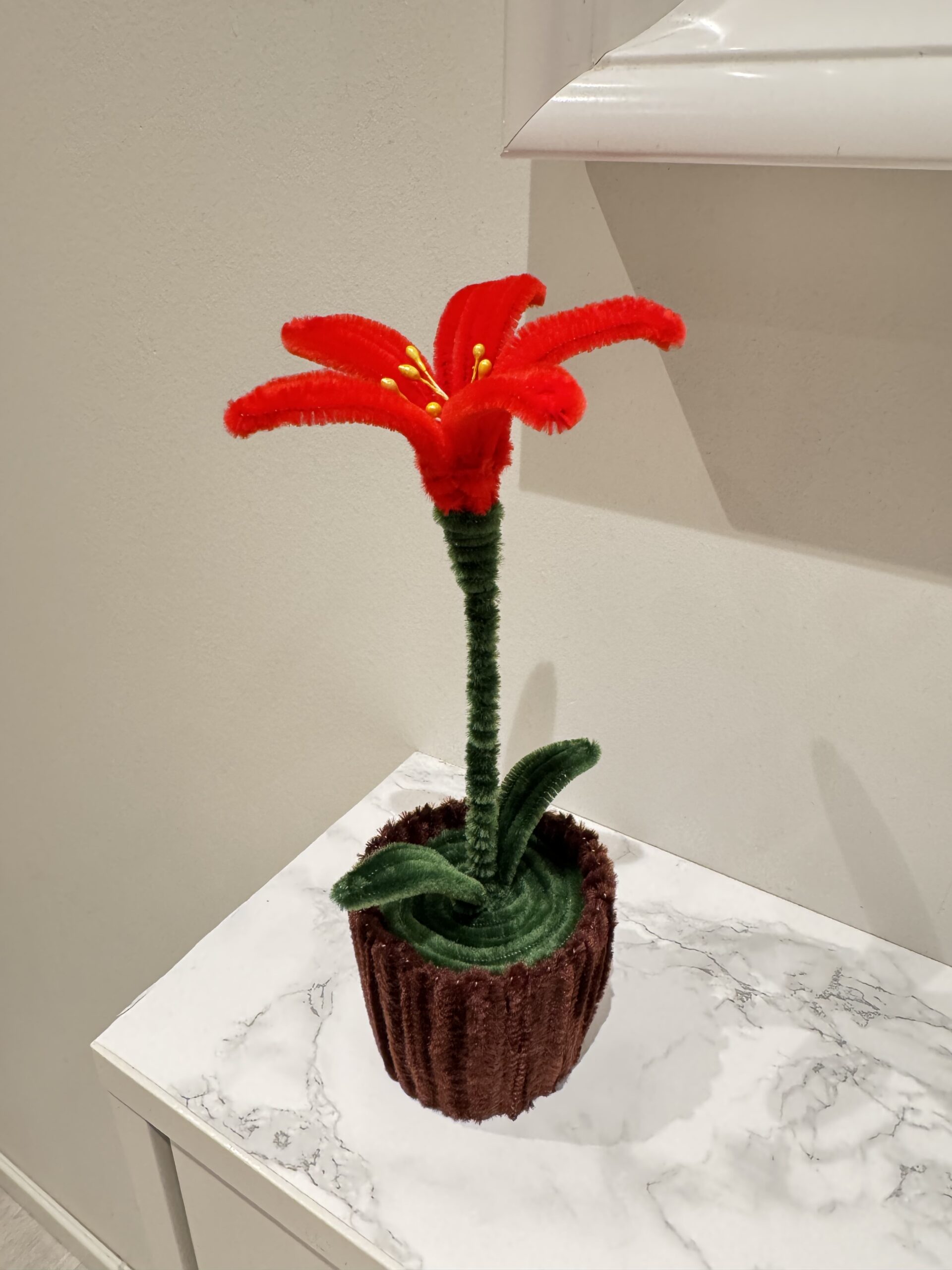 Håndlaget juleblomst av piperensere