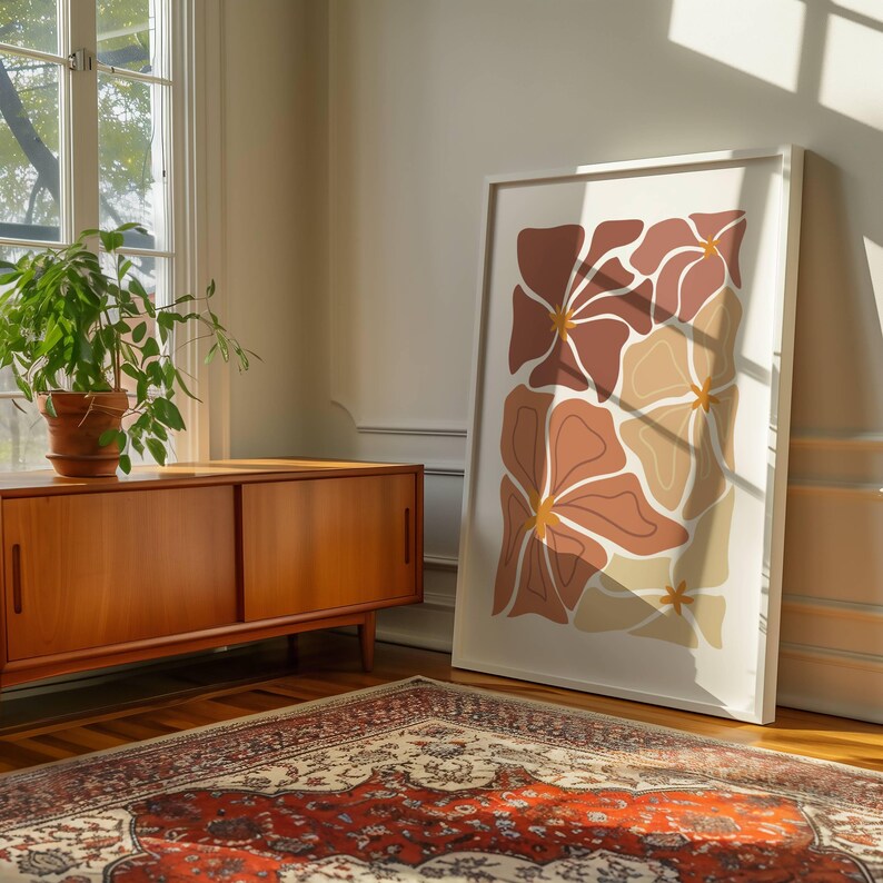 Abstrakt blomster kunstprint i terrakotta og grønne jordtoner i minimalistisk skandinavisk interiør