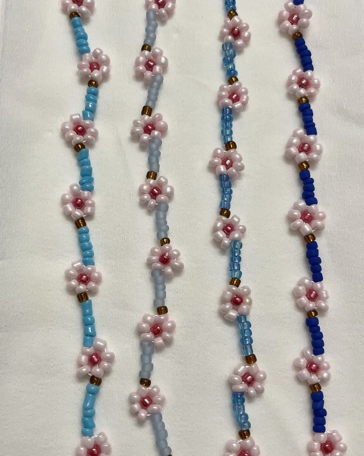 perlearmbånd med sakura-design